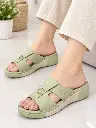 Sage Green Sandals in a Bright Studio.webp